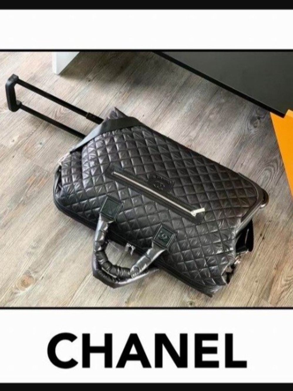 Chanel Black Quilted Rolling Travel Bag